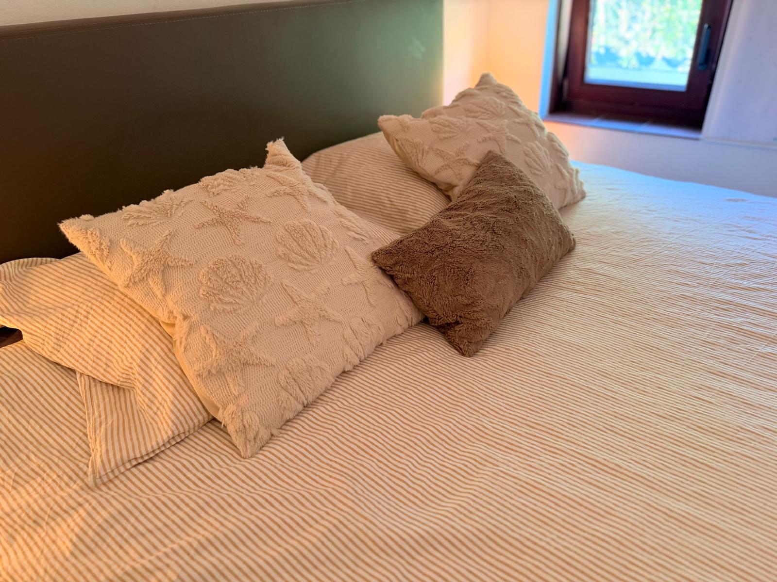 Downstairs bedroom with a double bed